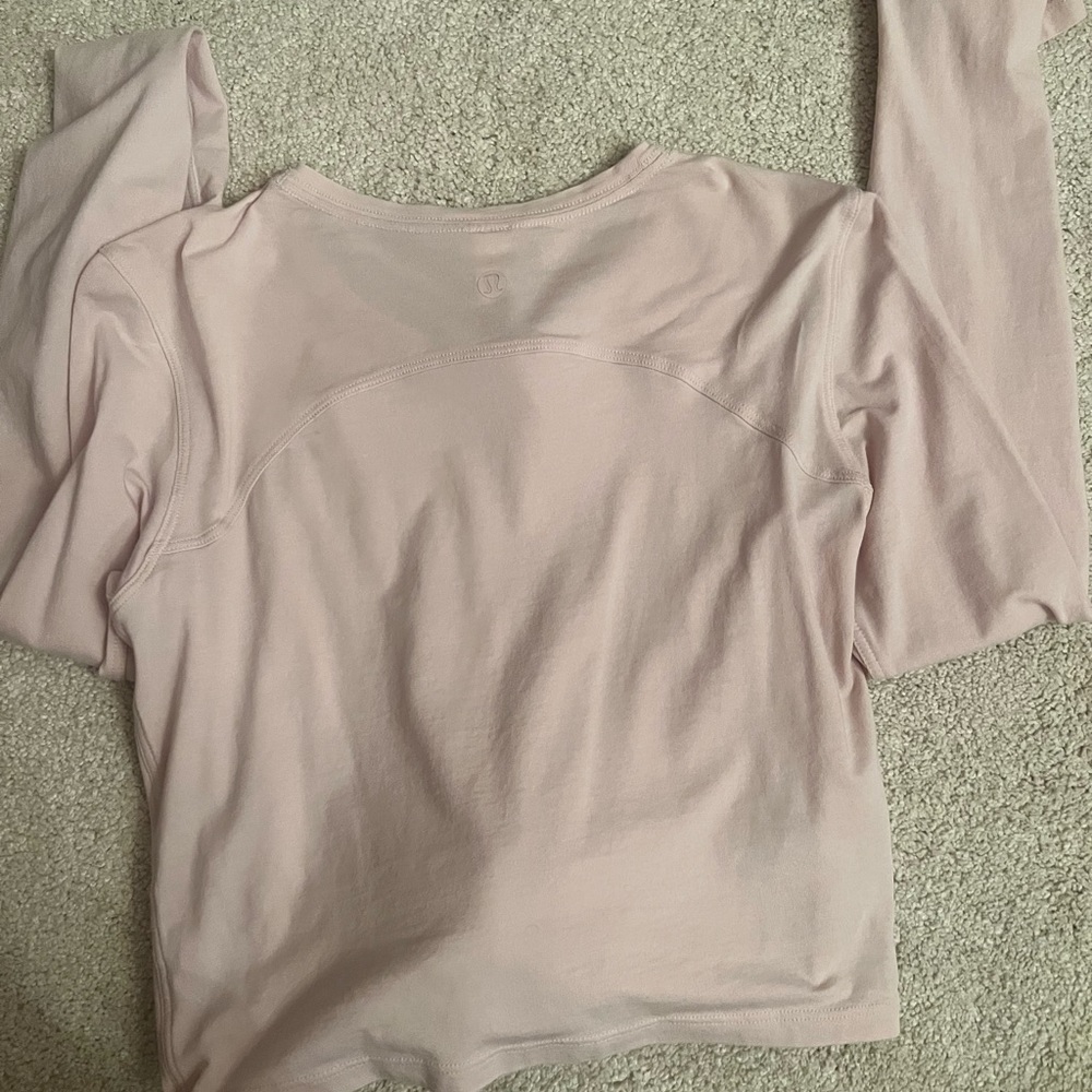 lulu-lemon long sleeve that ties in the front.